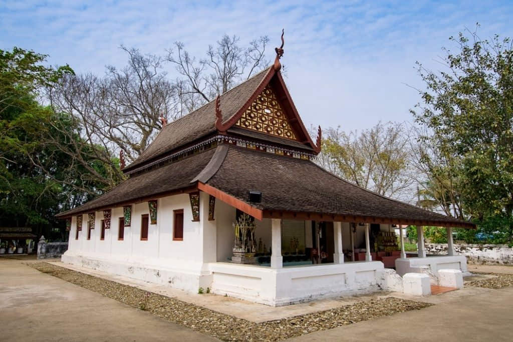 เสาไม้ลงลายทองในวิหารไทลื้อวัดหนองแดง อำเภอเชียงกลาง